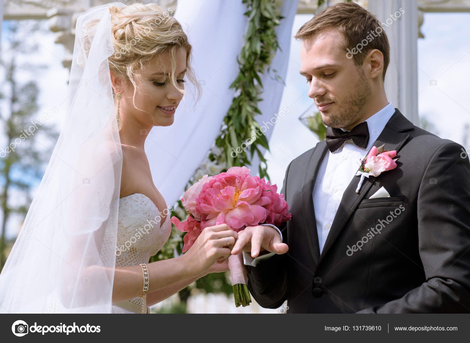 depositphotos_131739610-stock-photo-wedding-couple-registering-marriage.jpg