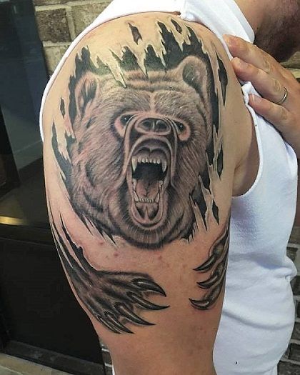 Ripped-Skin-Roaring-Bear-Tattoo-On-Right-Half-Sleeve-By-Zak-Schulte.jpg