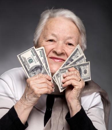 depositphotos_42708531-stock-photo-old-woman-holding-money-in.jpg